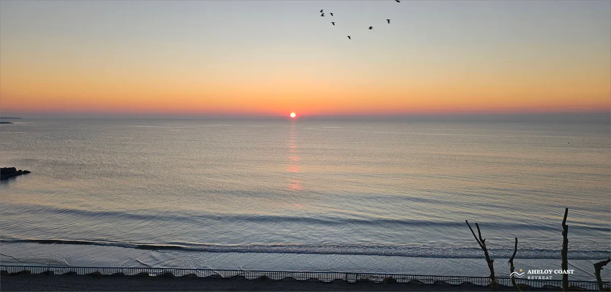 Sunrise over Burgas Bay seen from the 5th floor balcony of Aheloy Coast Retreat