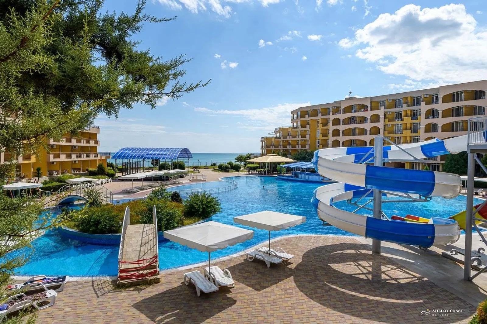 Midia Family Resort waterpark with slides and pools by the sea